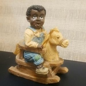 Figurine: Boy on Rocking Horse